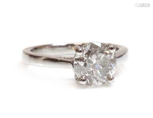 A platinum single stone diamond ring,