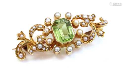 A late Victorian peridot and split pearl scrolling bar brooc...