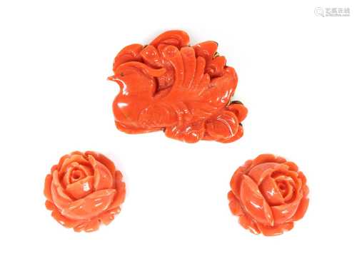 An Asian carved coral plaque brooch,