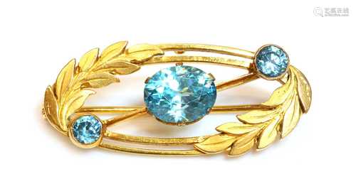 A gold blue zircon oval wreath brooch, by Payton Pepper, c.1...