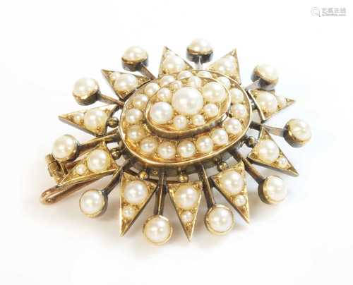 A Victorian gold split pearl oval starburst brooch/pendant, ...