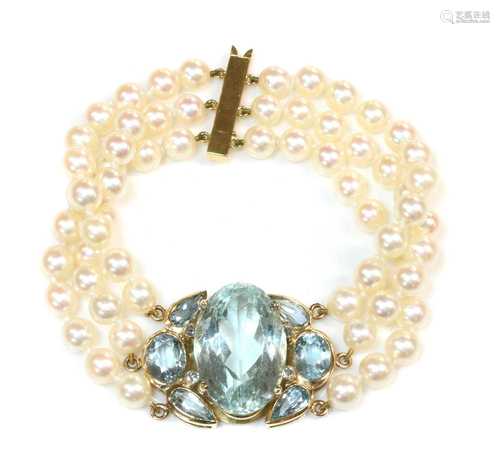 A 9ct gold aquamarine and cultured pearl bracelet, by Cassan...