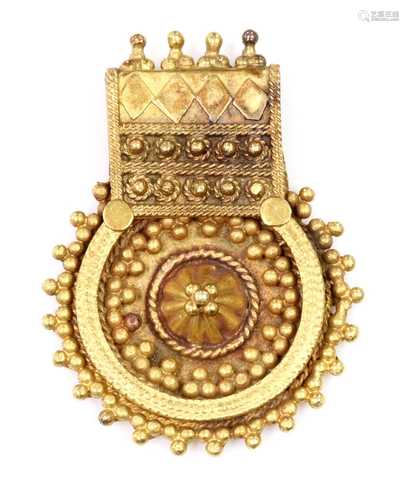 An Indian high carat gold pendant,