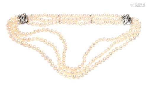 A three row cultured pearl necklace and bracelet suite,