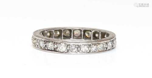 A platinum diamond set full eternity ring,