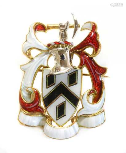 An 18ct two colour gold polychrome enamel coat of arms brooc...