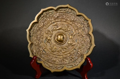 A fine CARVED BRONZE MIRROR