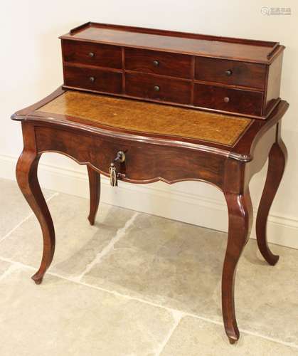 A Louis XV style walnut bonheur du jour, late 19th/early 20t...