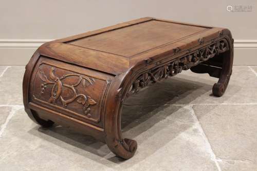 A Chinese carved wood scholars table, the rectangular panell...