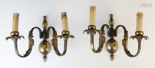 A pair of brass two branch wall light fittings, early 20th c...