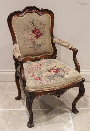 A Louis XV style walnut fauteuil, late 19th century, the fol...