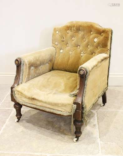 A Victorian walnut and green velour low seat ladies armchair...