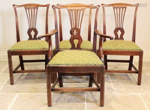 A set of seven George III mahogany Hepplewhite style dining ...