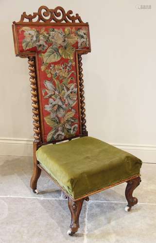 A Victorian rosewood prie dieu chair, the interlaced fretwor...