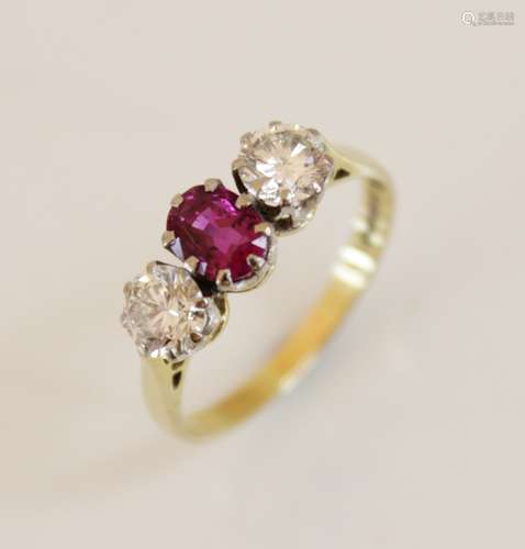 An 18ct gold pink sapphire and diamond three-stone ring, com...