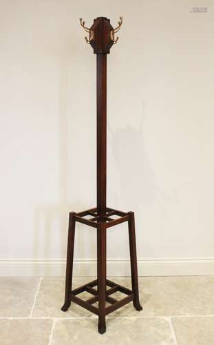 An early 20th century Arts and Crafts mahogany freestanding ...