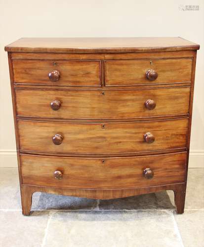 A Victorian mahogany bow front chest of drawers, formed from...