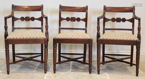 A pair of Regency mahogany carver chairs, each with a concav...