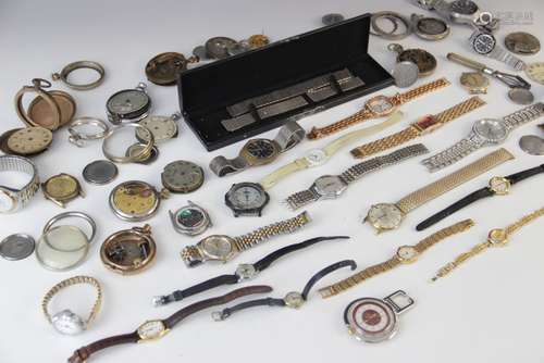 A collection of assorted watch parts, to include mechanical ...