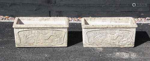 A pair of Yellowstone rectangular stone planters, each cast ...