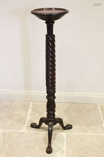 A Chippendale influence mahogany torchere, early 20th centur...