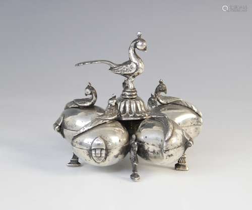 An Indian white metal spice box, comprising five petal form ...