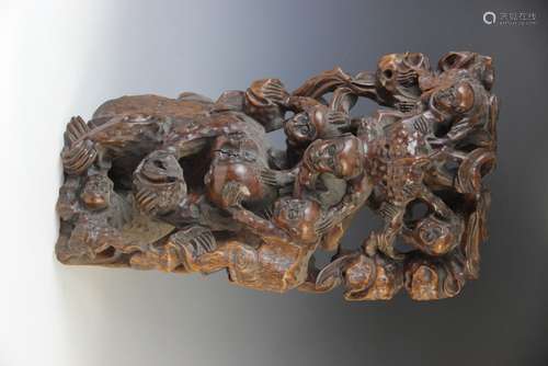 A large Chinese root wood carving, 19th century, depicting m...