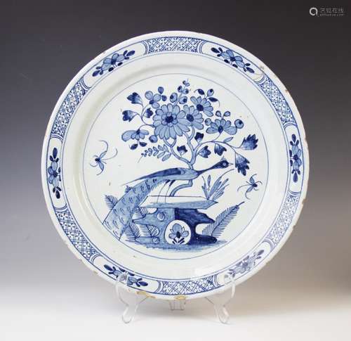 A Delft ware charger, 18th century, the tin glazed earthenwa...