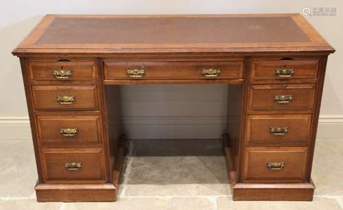 An Edwardian mahogany twin pedestal writing desk, with a rec...