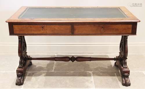 A William IV mahogany writing table, the rectangular moulded...