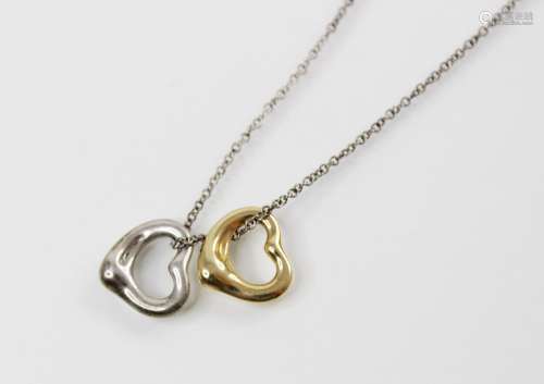 A Tiffany & Co Elsa Peretti 18ct gold open heart pendant, 11...