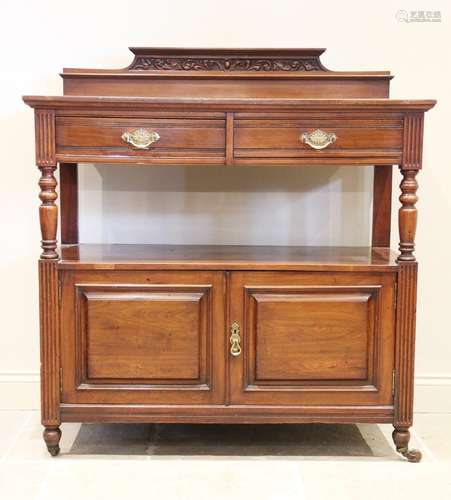 A late Victorian walnut dumb waiter, with a scrolling leaf c...