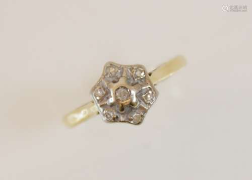 A diamond floral cluster 18ct gold ring, comprising seven si...