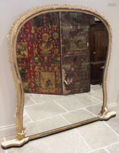 A gilt wood and gesso over mantel mirror of large proportion...