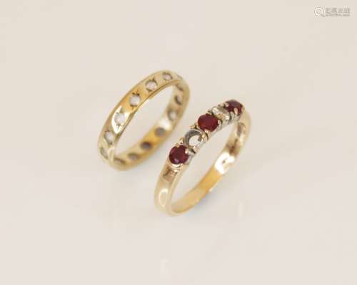 A ruby and diamond 9ct gold ring, comprising three round mix...