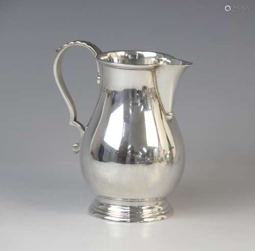 A George VI silver milk jug by Blackmore & Fletcher Ltd, Lon...