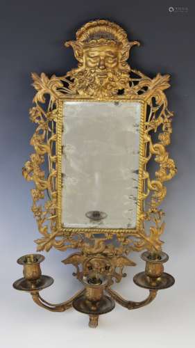 A gilt brass mirror back girandole, late 19th century, the r...