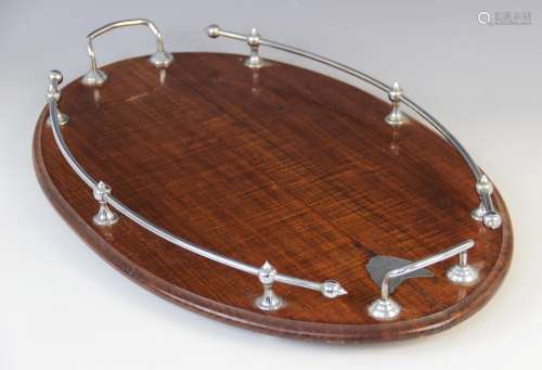 An early 20th century mahogany gallery drinks tray, of oval ...