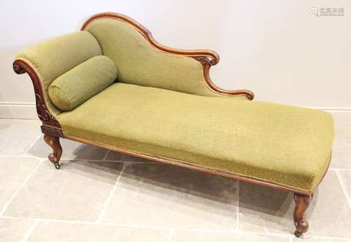 A Victorian mahogany framed chaise longue, the shaped padded...