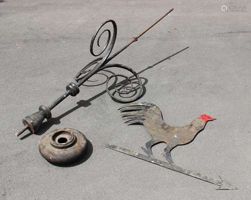 A weather vane modelled as a cockerel, of typical form, the ...