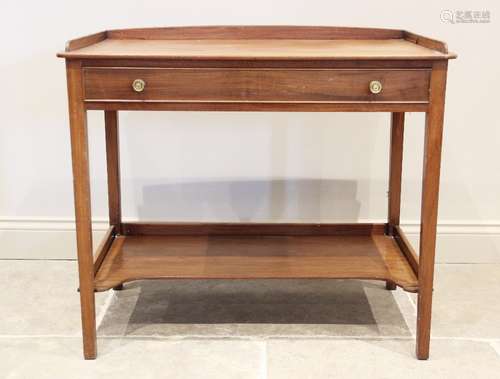 An early 19th century mahogany side table, the rectangular t...