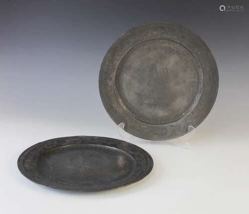 Two continental pewter chargers, 19th century, each with scr...