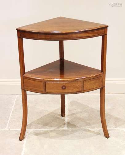 A George III mahogany corner washstand, later converted, the...