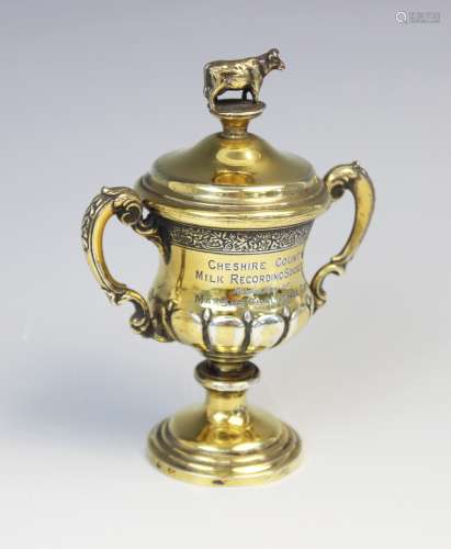 A George V miniature silver gilt cup and cover by Elkington ...