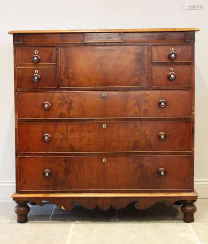 A mid 19th century mahogany chest of drawers, the rectangula...