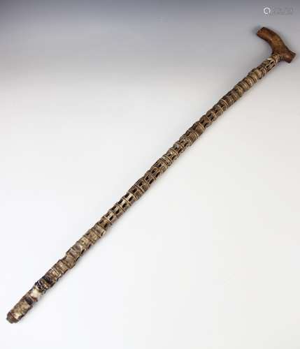 A 19th century vertebrae walking stick, with wooden handle, ...