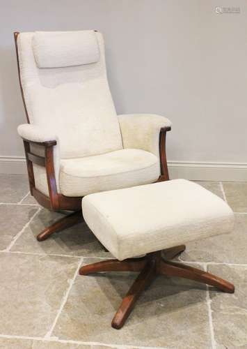 A late 20th/early 21st century Ercol studio open armchair an...