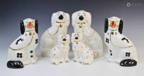 Two pairs of Beswick spaniels, 20th century, comprising; mod...