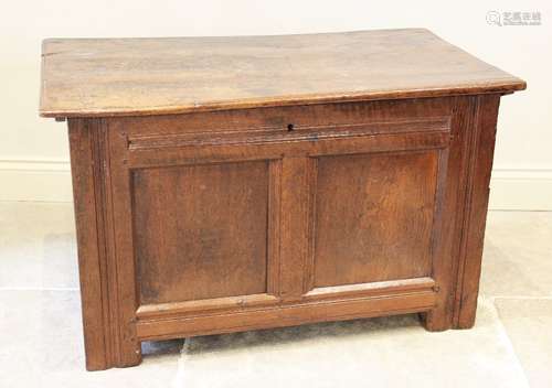 An 18th century and later oak coffer, the rectangular moulde...