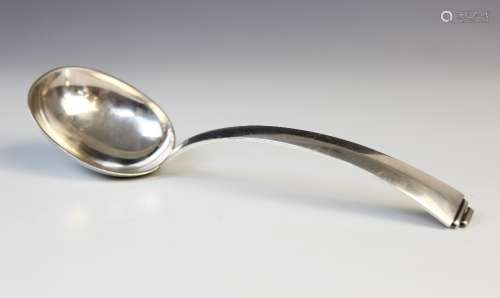 A mid-century Danish 830S silver soup spoon, the oval bowl w...